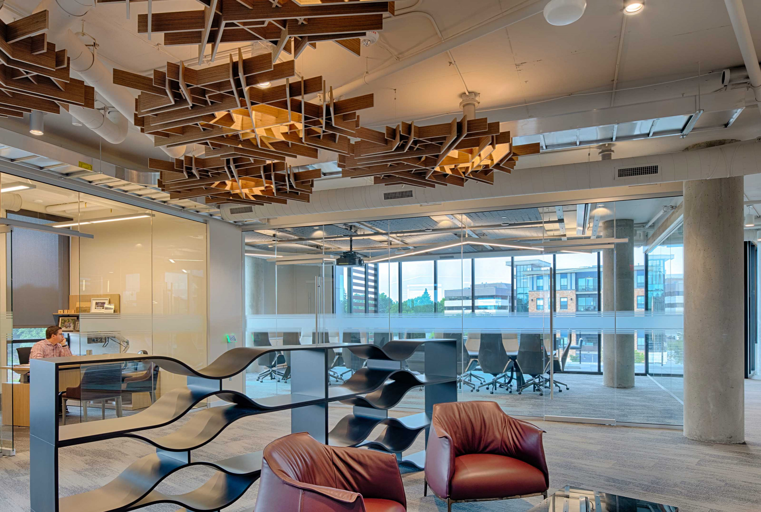 Arktura SoftGrid Flux acoustic baffles over an open work area at Bridgewater Bank, St. Louis Park MN