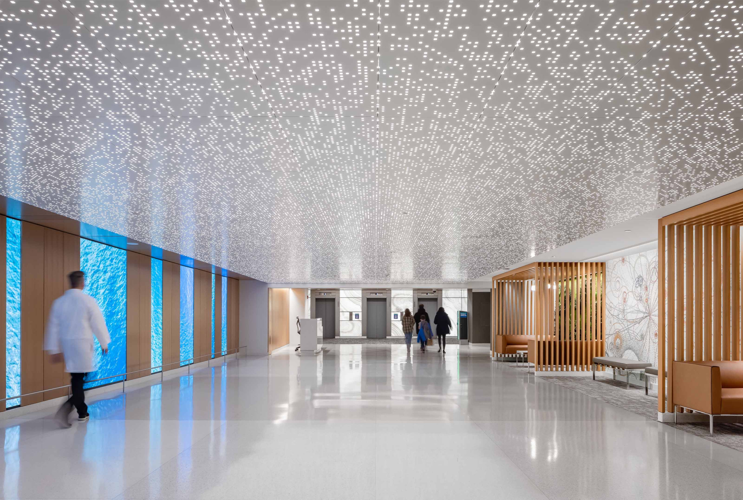 Arktura Vapor Syntax backlit perforated panels in the Mayo Clinic subway level, Rochester MN